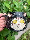 Cat mug in pyjamas